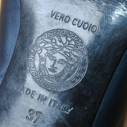 Vintage versus versace - vintage,